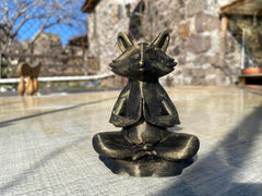 Hand-painted raccoon sculpture for home decor