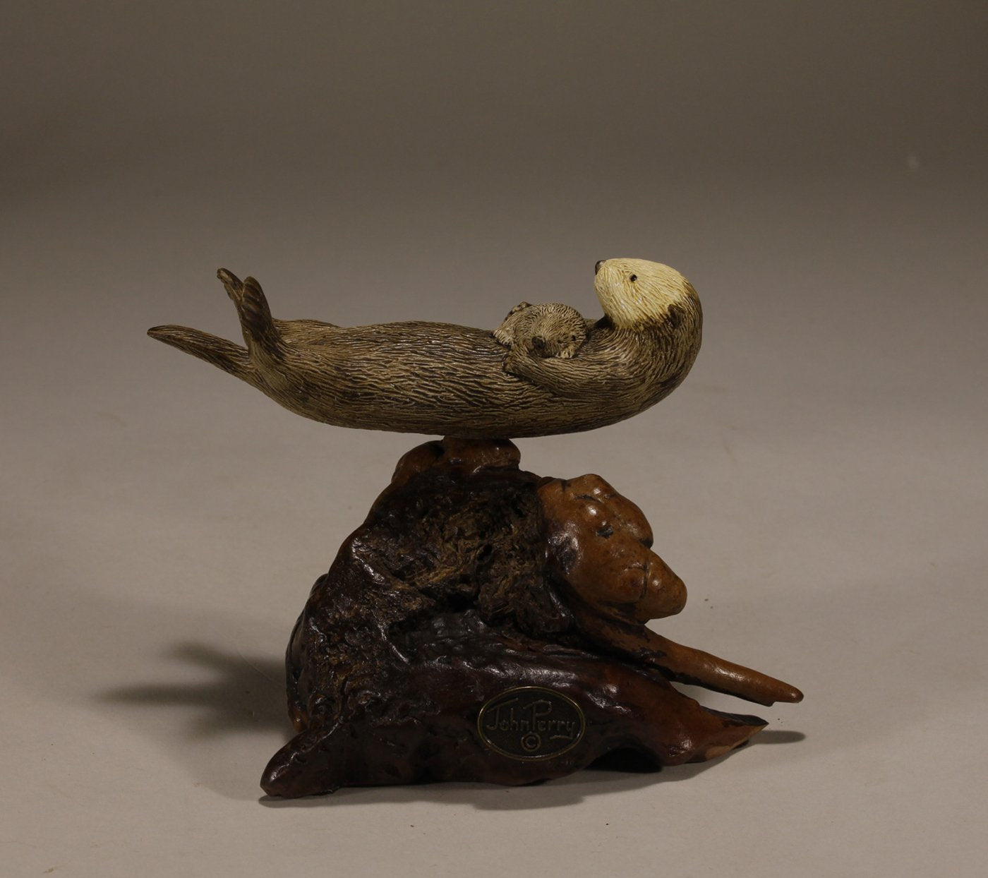 Certificate of Authenticity included with sea otter sculpture