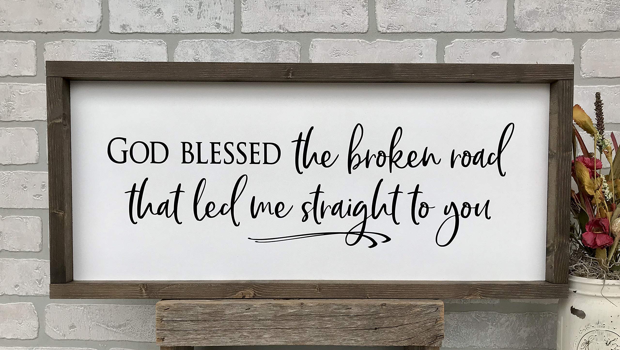 Soft white background with matte black lettering
