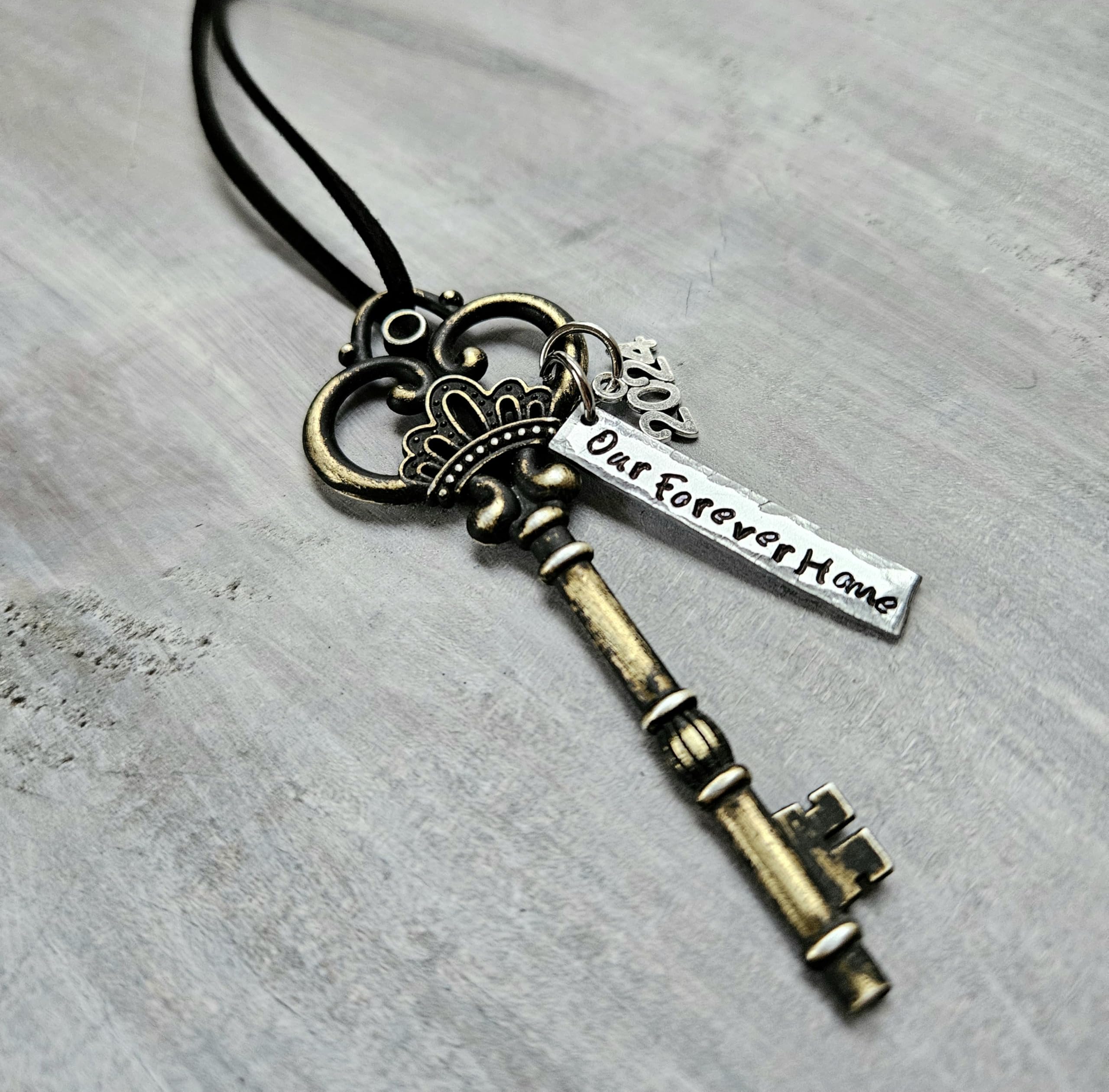 Hand-stamped USA ornament with personalized details for new home