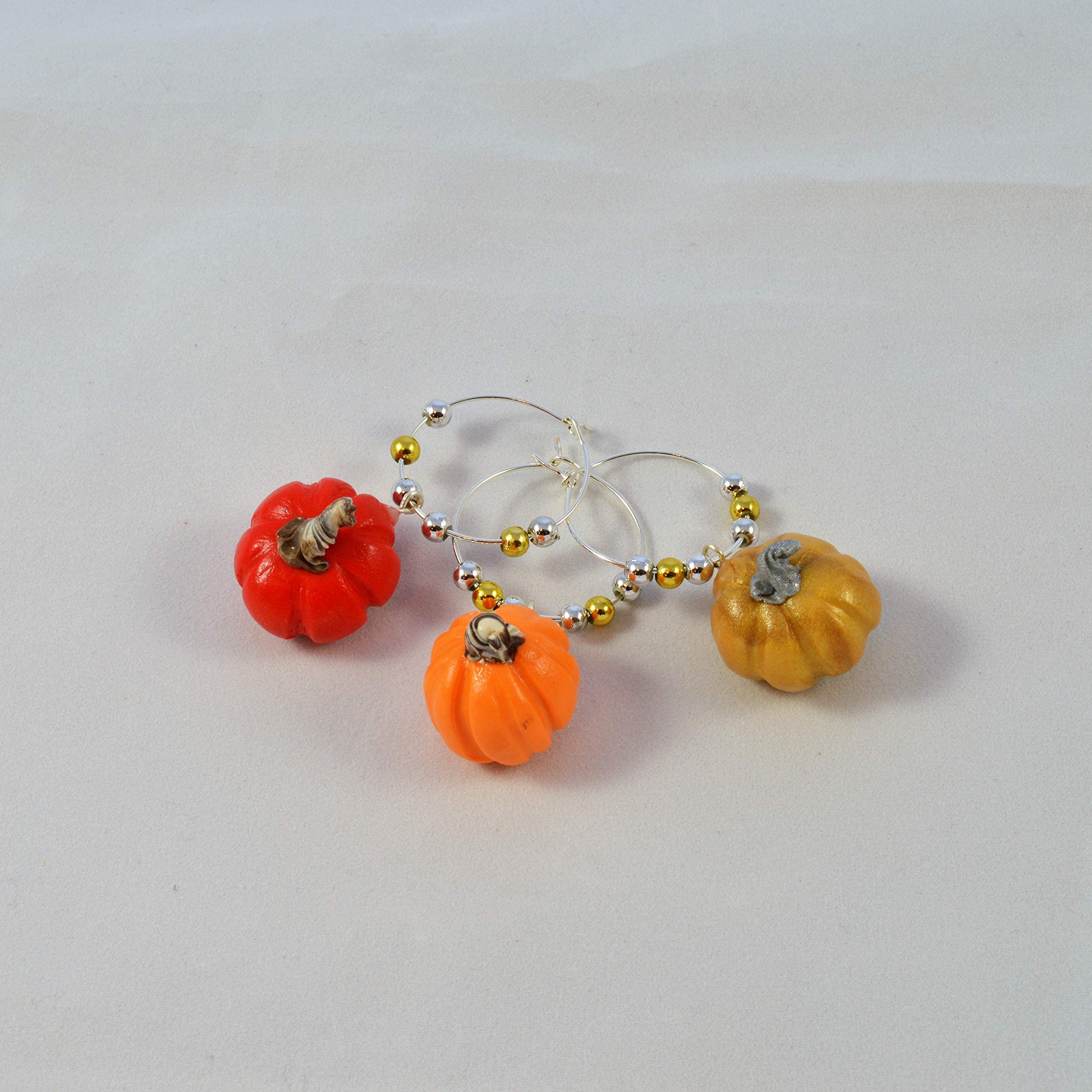 Handcrafted charms with no molds used for each pumpkin