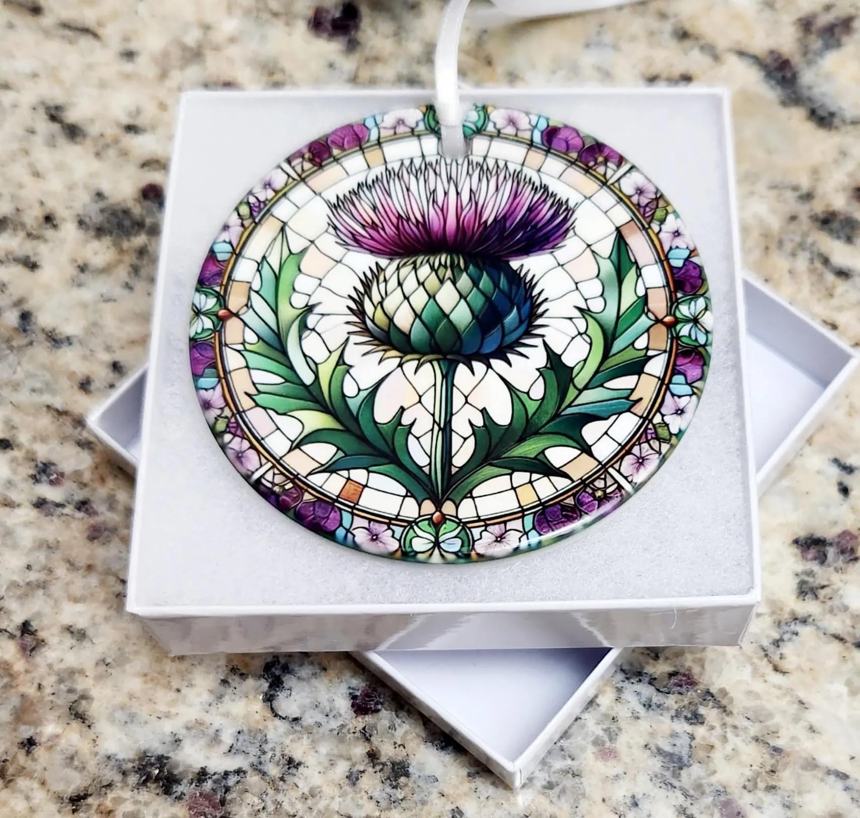 Handmade ceramic ornament with Scottish thistle motif