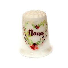 Handmade collectible thimble Nana with floral heart wreath featuring red flowers
