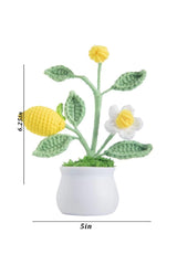 Close up of cotton yarn-woven leaves on lemon tree crochet plant