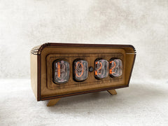 Vintage desk clock with warm glow from IN-12 tubes