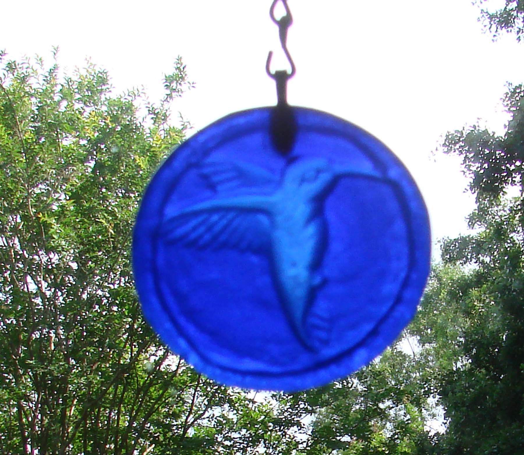 Kiln fired hummingbird embossing on cobalt blue glass