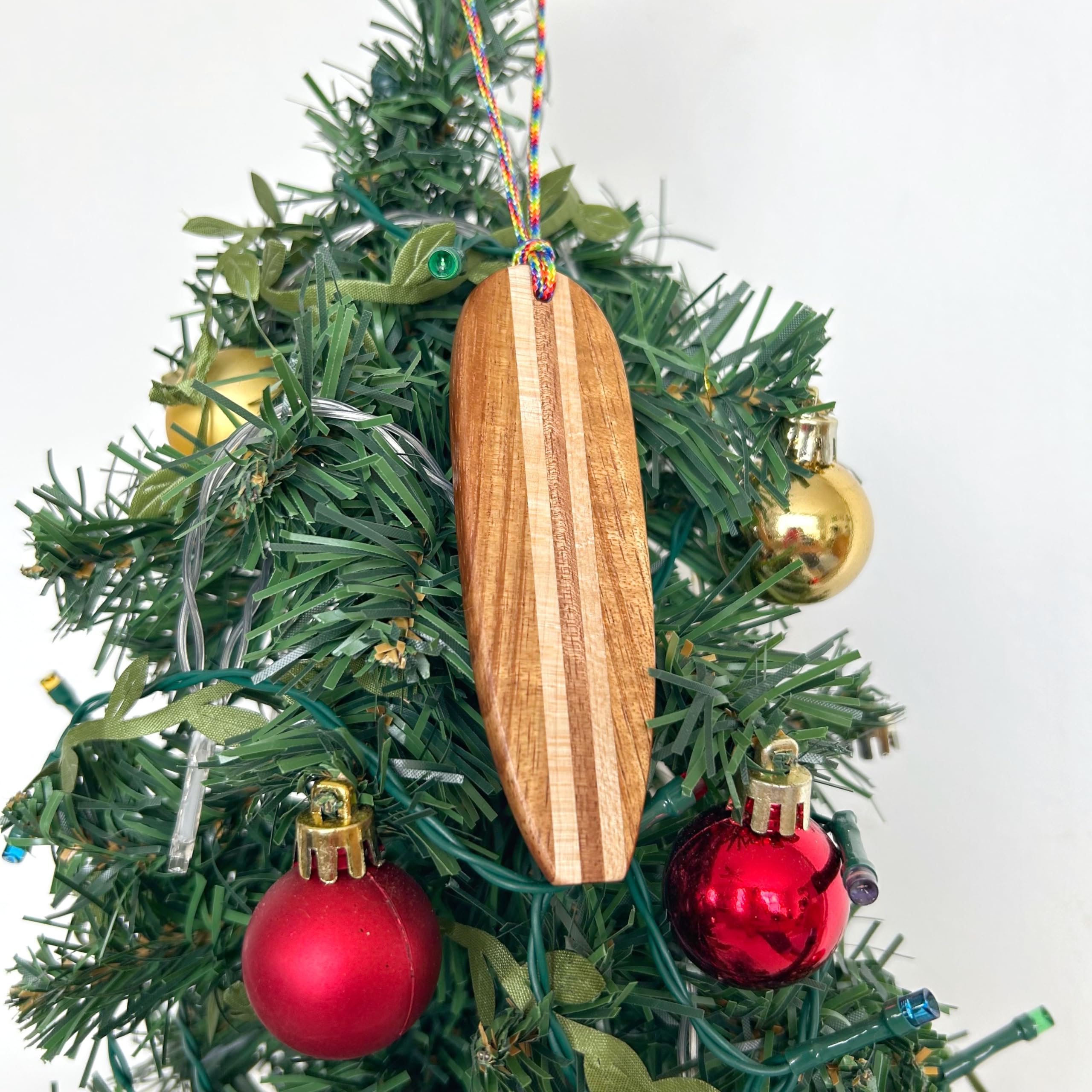 Koa and Kamani wood ornament crafted in Hawaii
