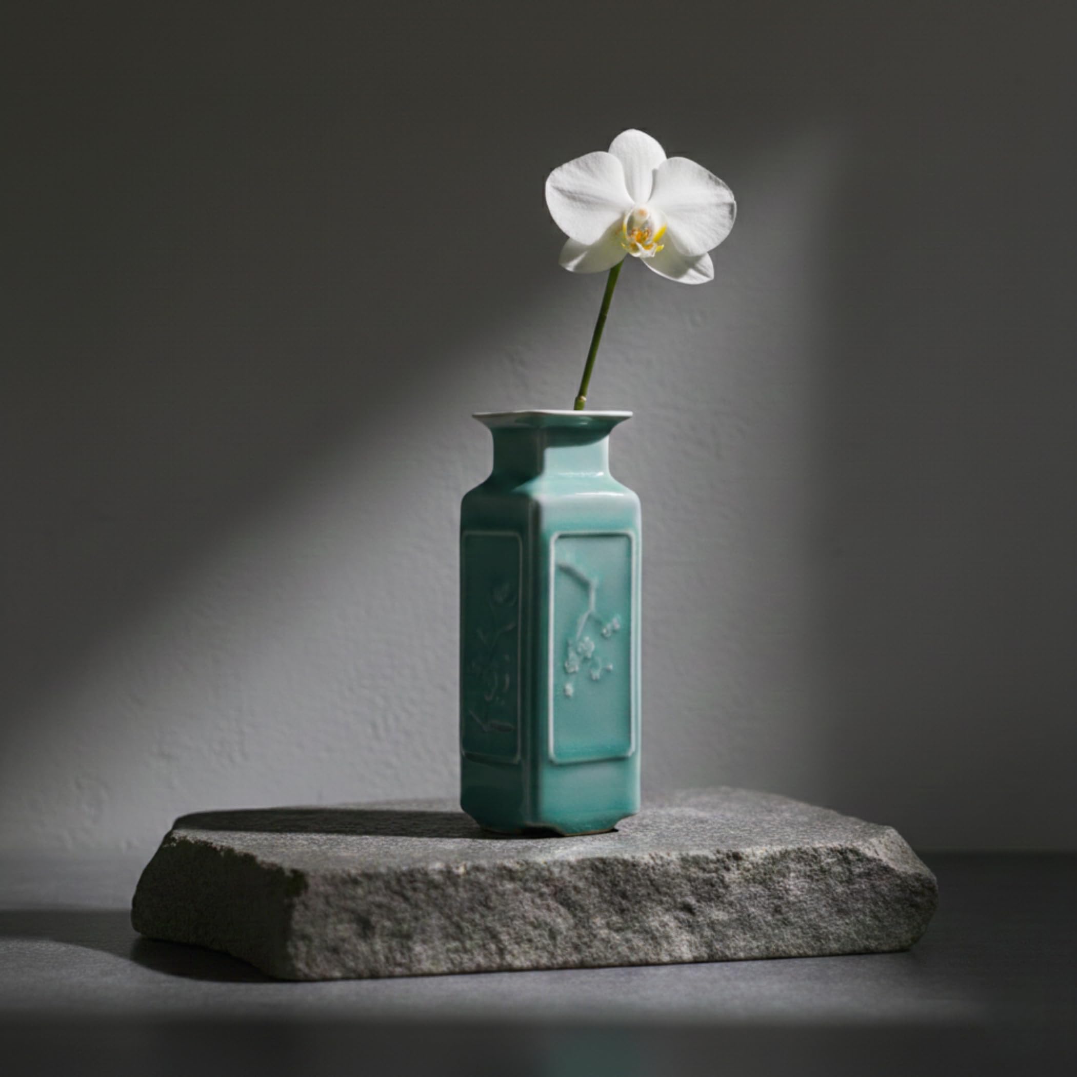 Handmade square bud vase with relief panels for shelf display