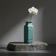 Handmade square bud vase with relief panels for shelf display