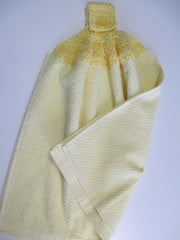 Towel with button for easy hanging