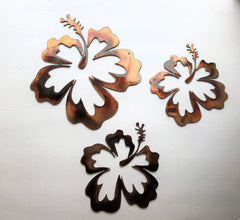 Two smaller hibiscus wall art pieces each 5x5.5 inches