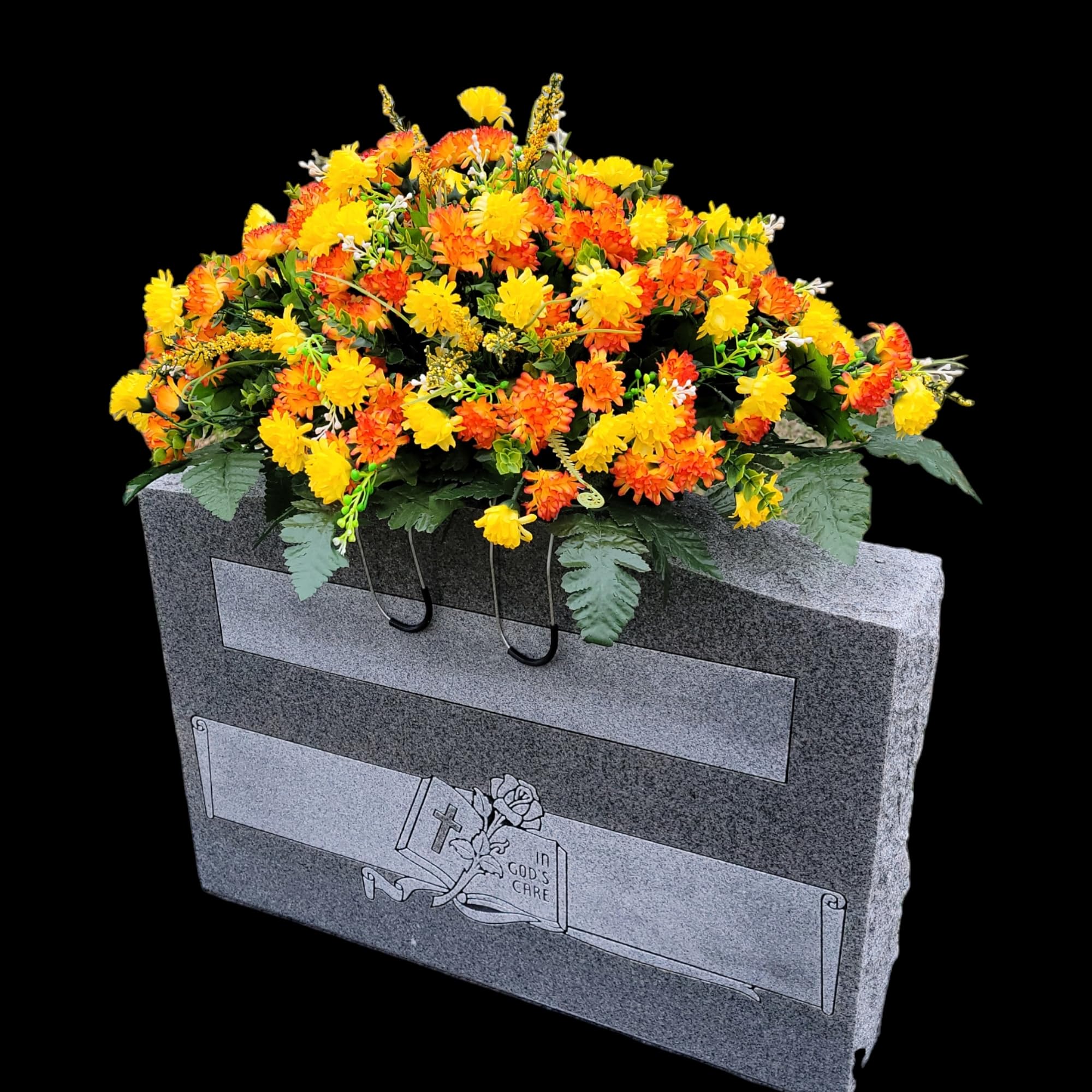Protective rubber coverings on saddle legs for grave display