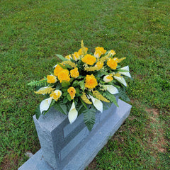 Headstone saddle with yellow roses garnish