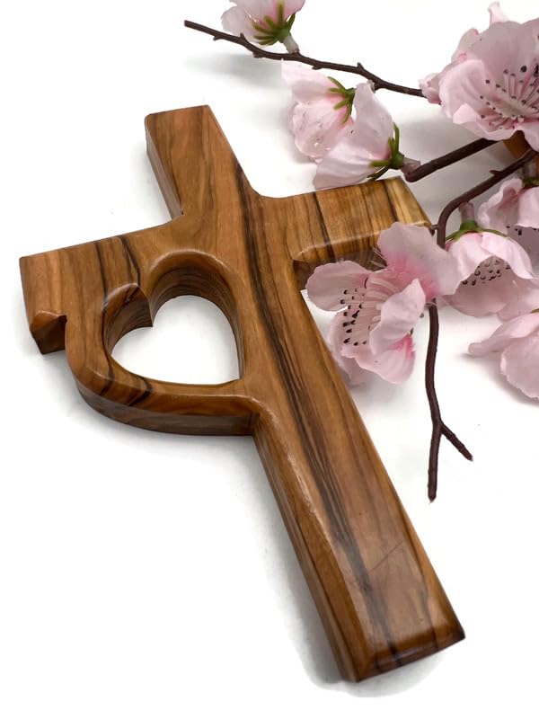Heart carved on the side of the olive wood cross