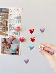 Pink heart magnet from colorful fridge magnets set