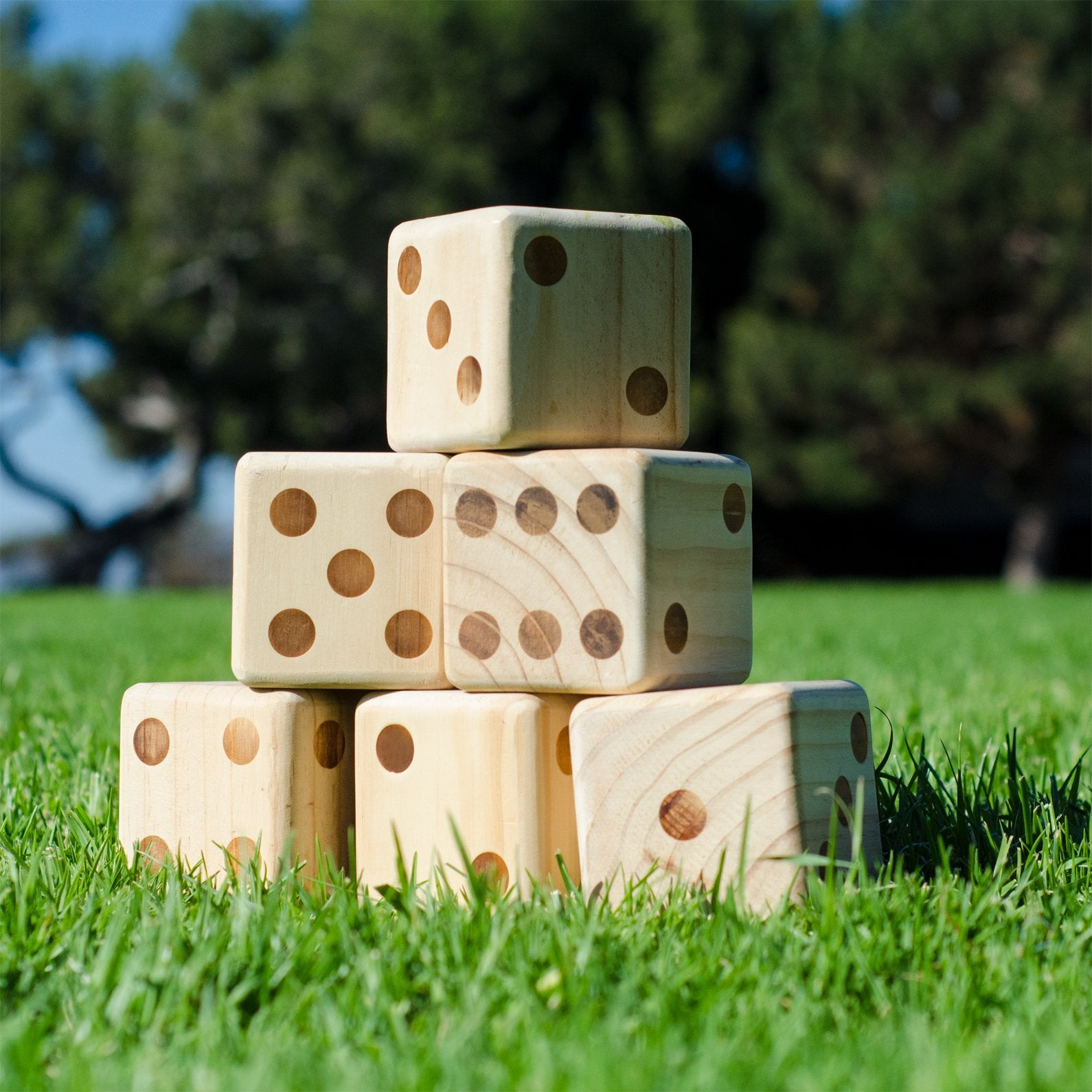 Burned-in numbers on wooden dice stay readable