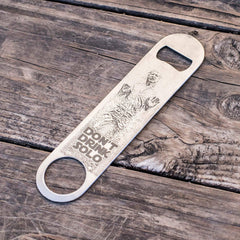 Bottle opener measures approx 7in long by 1.5in wide