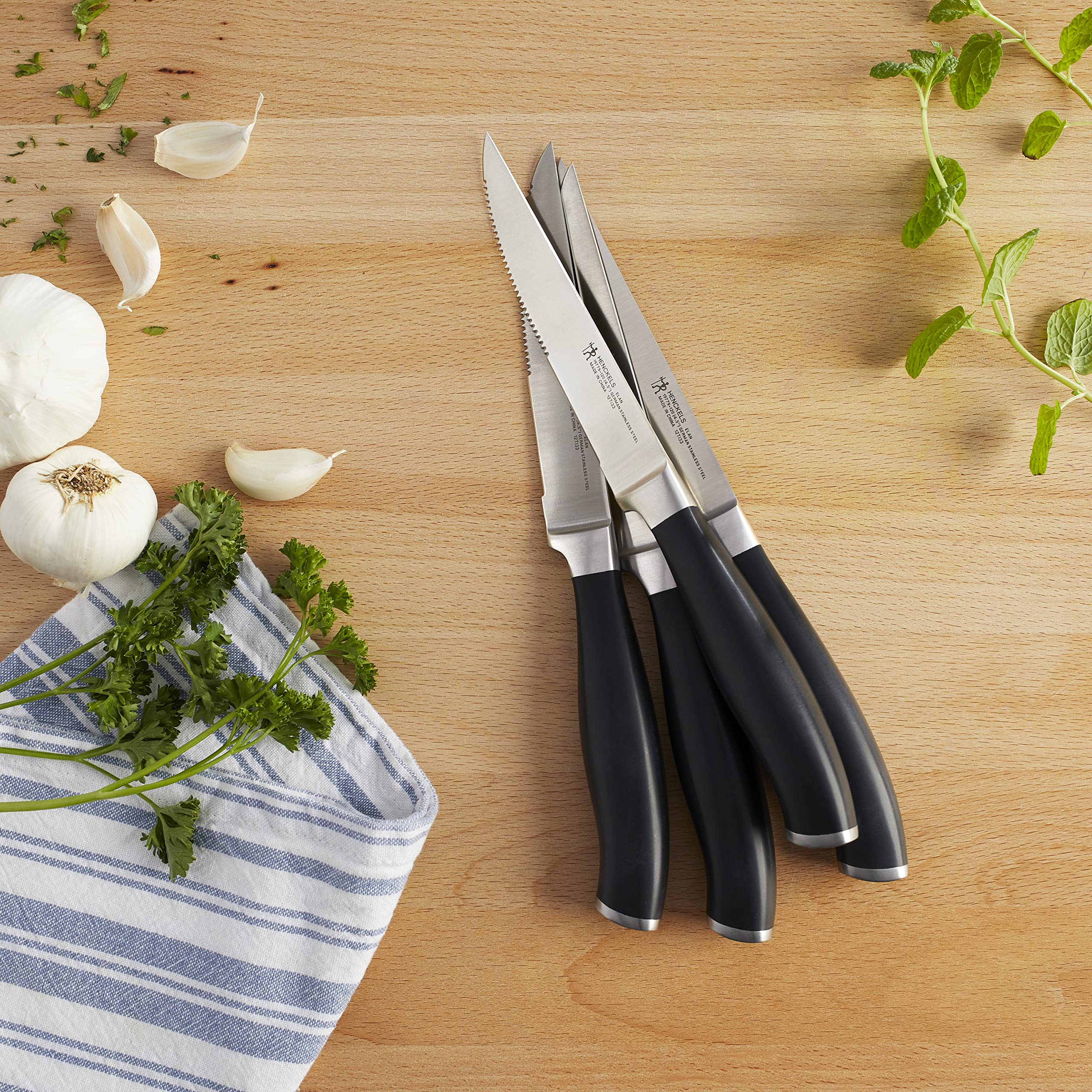 Ergonomic handle with stainless steel endcap Henckels Elan
