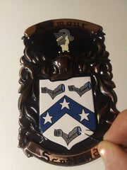 Heraldic Artist hand painting the crest
