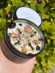 Candle topped with Black Tourmaline chips and Rose Buds cloves