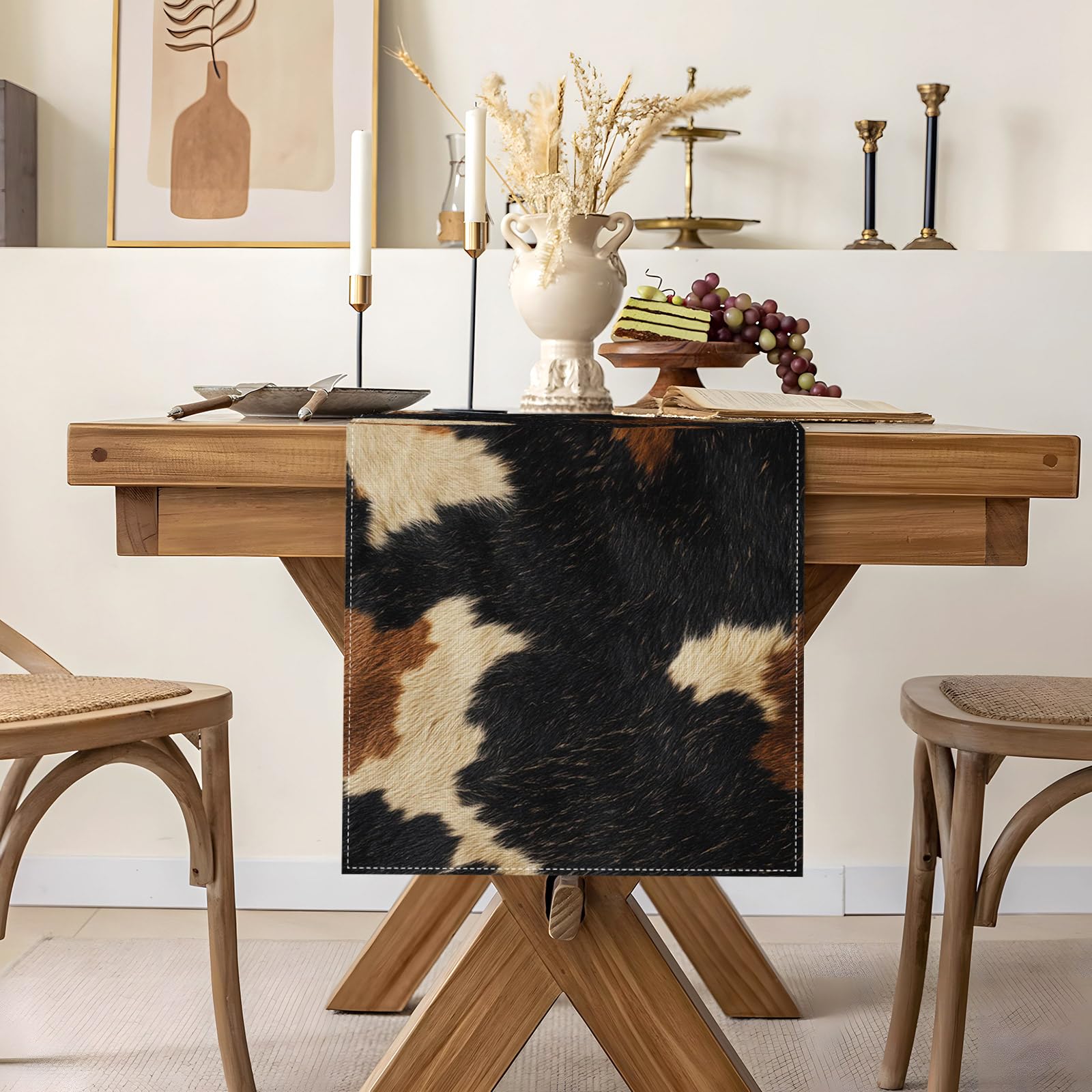 Table runner 13 x 72 inches cowhide print on a table