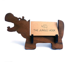 Hippo business card holder made from solid walnut wood on desk