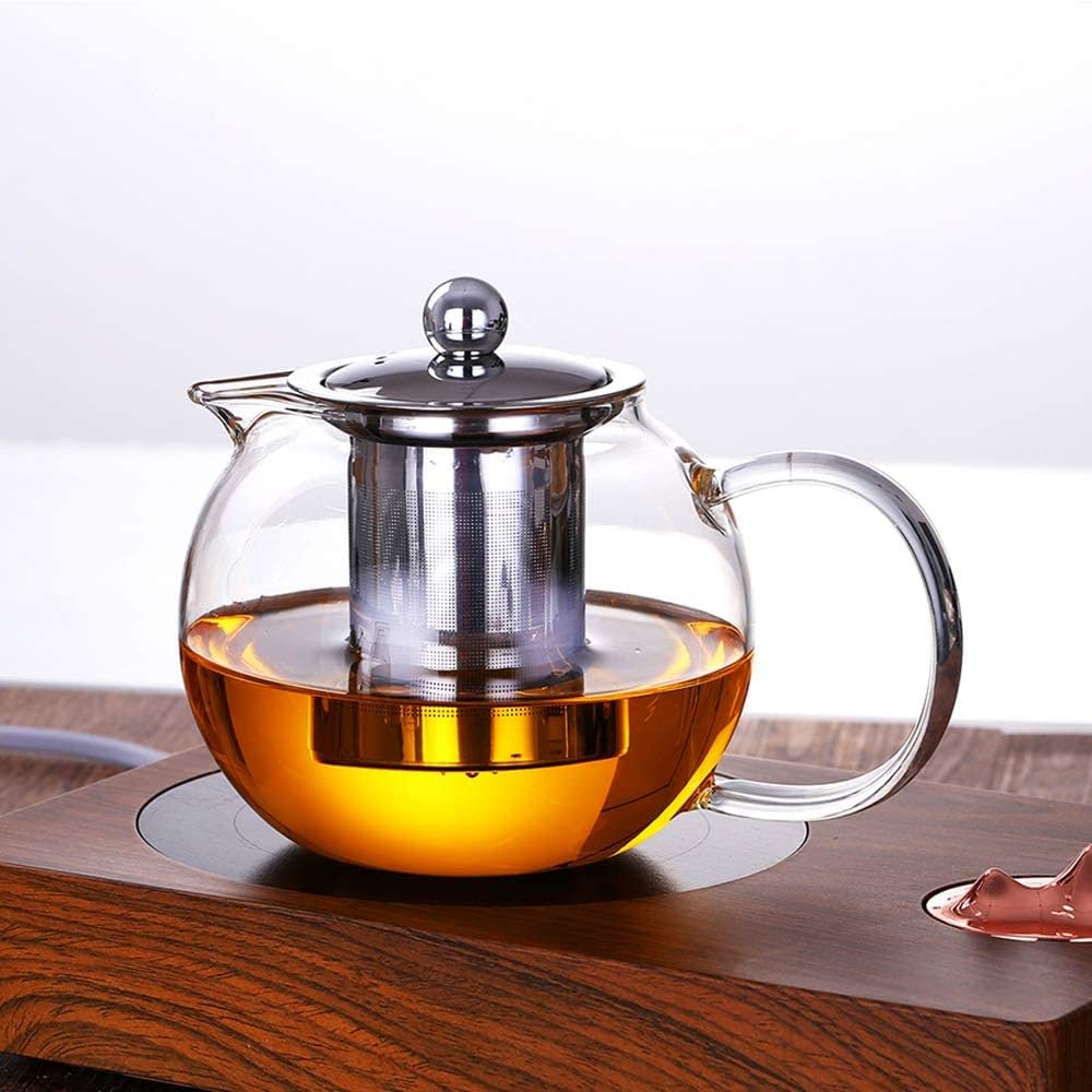 Close view of clear glass showing tea color during brewing