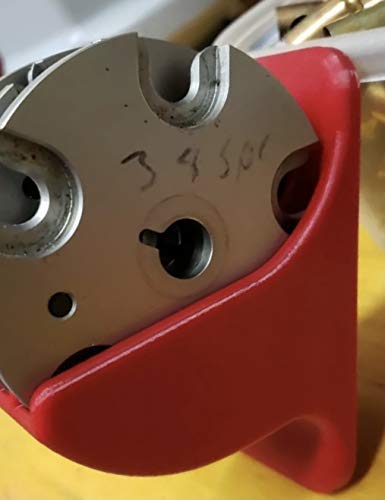Two countersunk holes spaced 3.5 inches apart for #6 screws