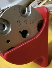 Two countersunk holes spaced 3.5 inches apart for #6 screws