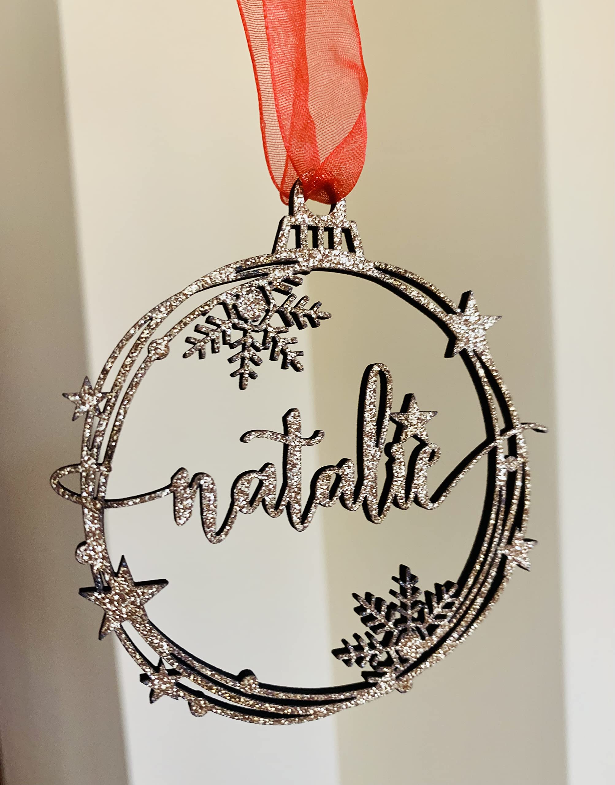 Holiday hanging ornament suitable for tree or place settings