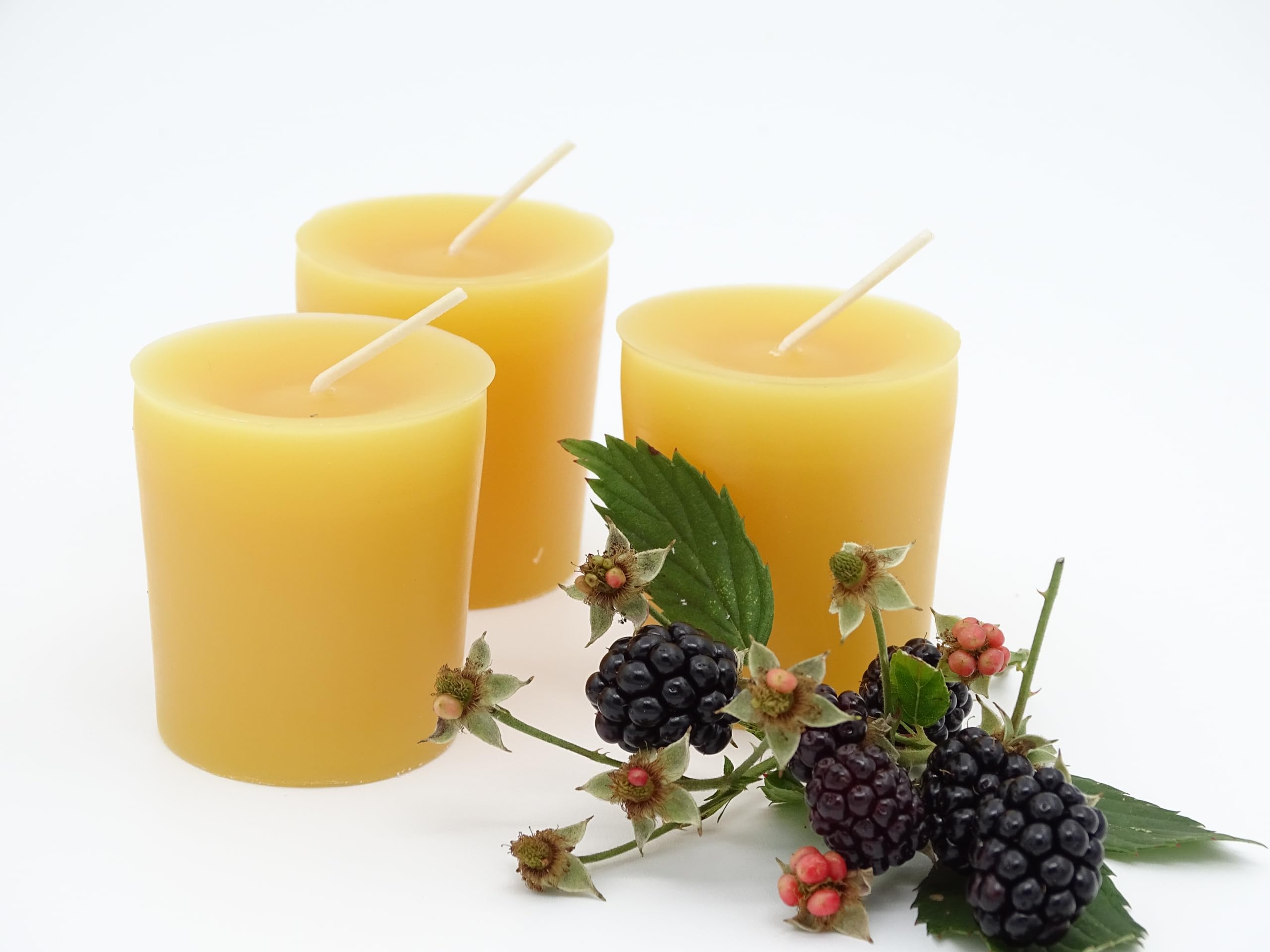 Honey scented beeswax votive candles with natural variation