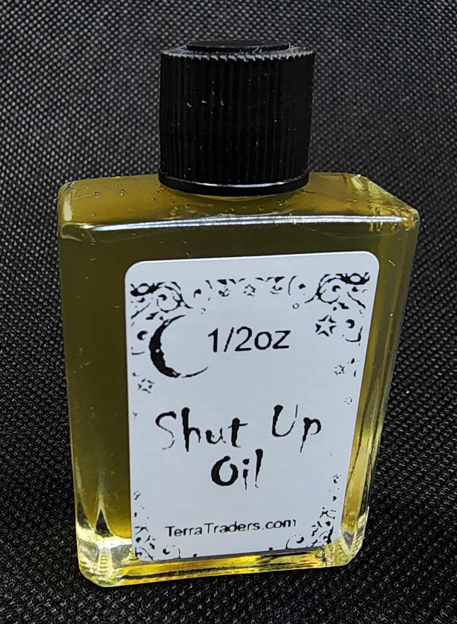 Shut Up Oil Hoodoo external use bottle close up
