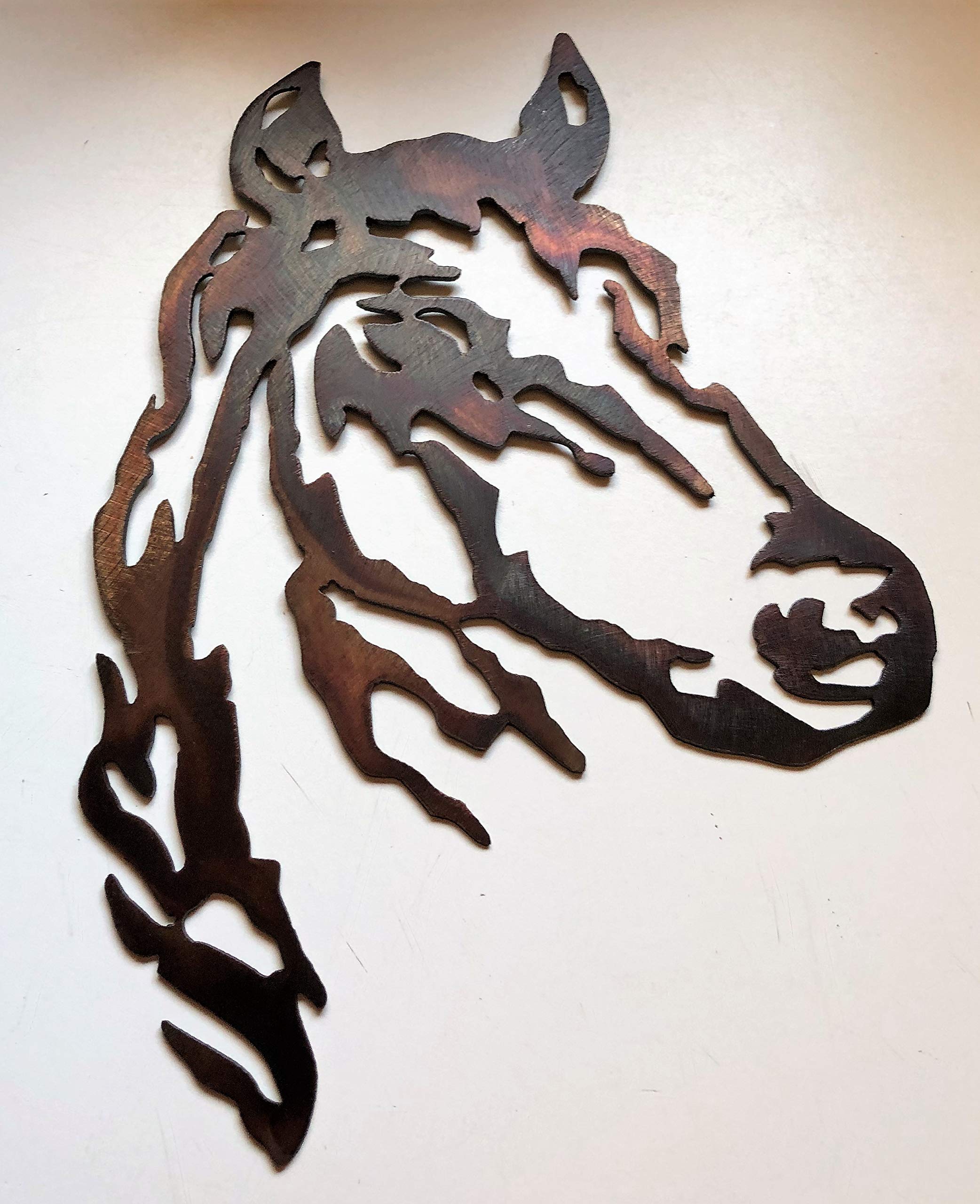 Copper bronze plated finish on horse head wall art