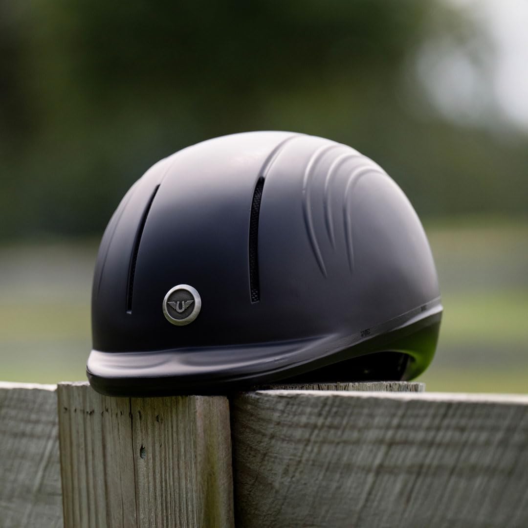 Washable inner liner and four air vents on TuffRider helmet