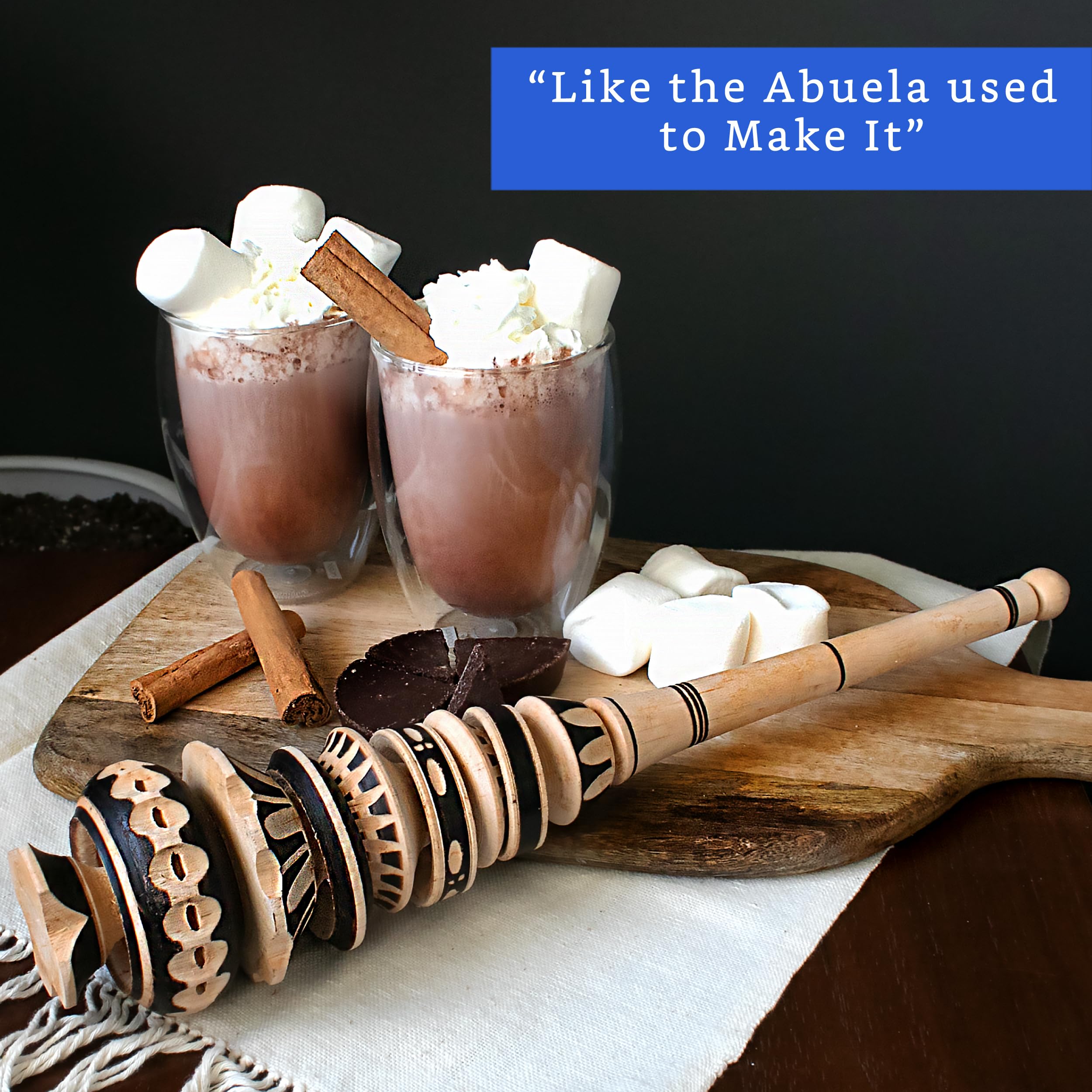 Hot chocolate molinillo frother in use with warm milk