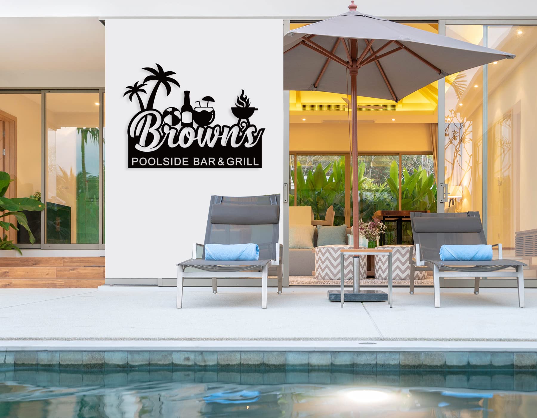 Welcom To Poolside sign mounted on patio wall