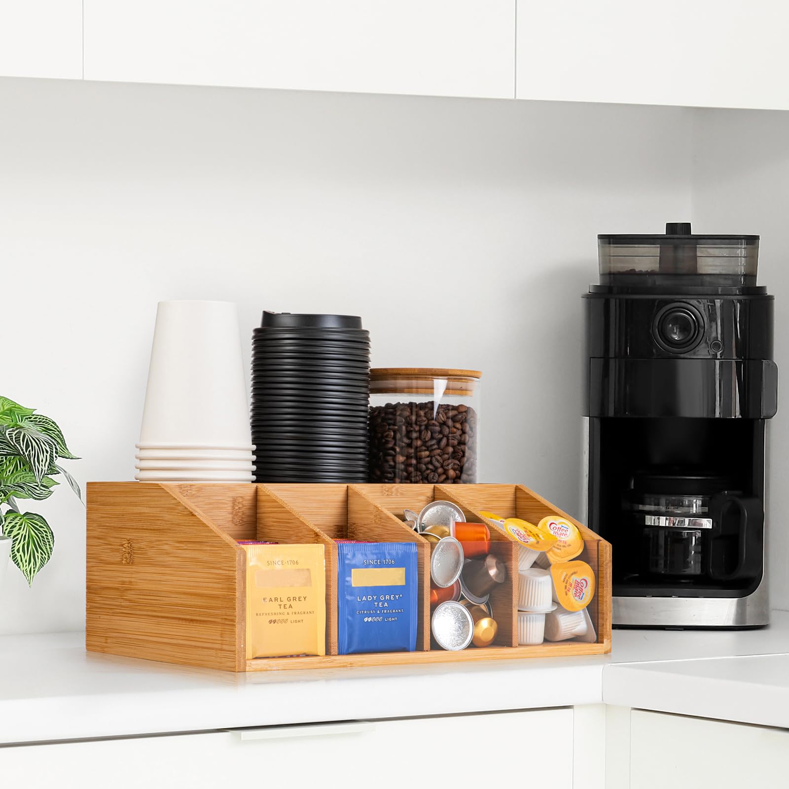 Stylish bamboo coffee bar organizer on kitchen counter