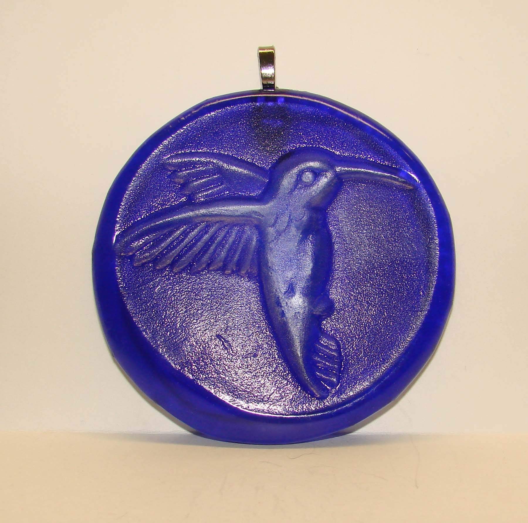 Back side shows pendant bail for hanging