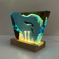 Solid wood and epoxy resin night light on desk