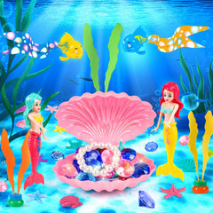 Two mermaid toys and assorted sea life accessories in HUUIDY kit