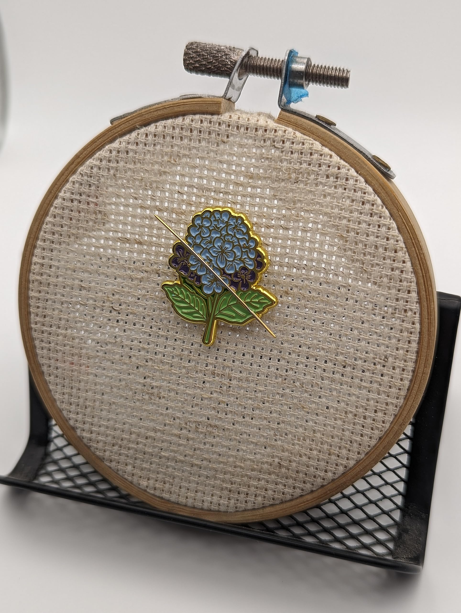 Needle rests on Hydrangea Needle Minder during a break