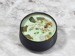 Candle infused with real herbs and crystals for Imbolt Sabbat