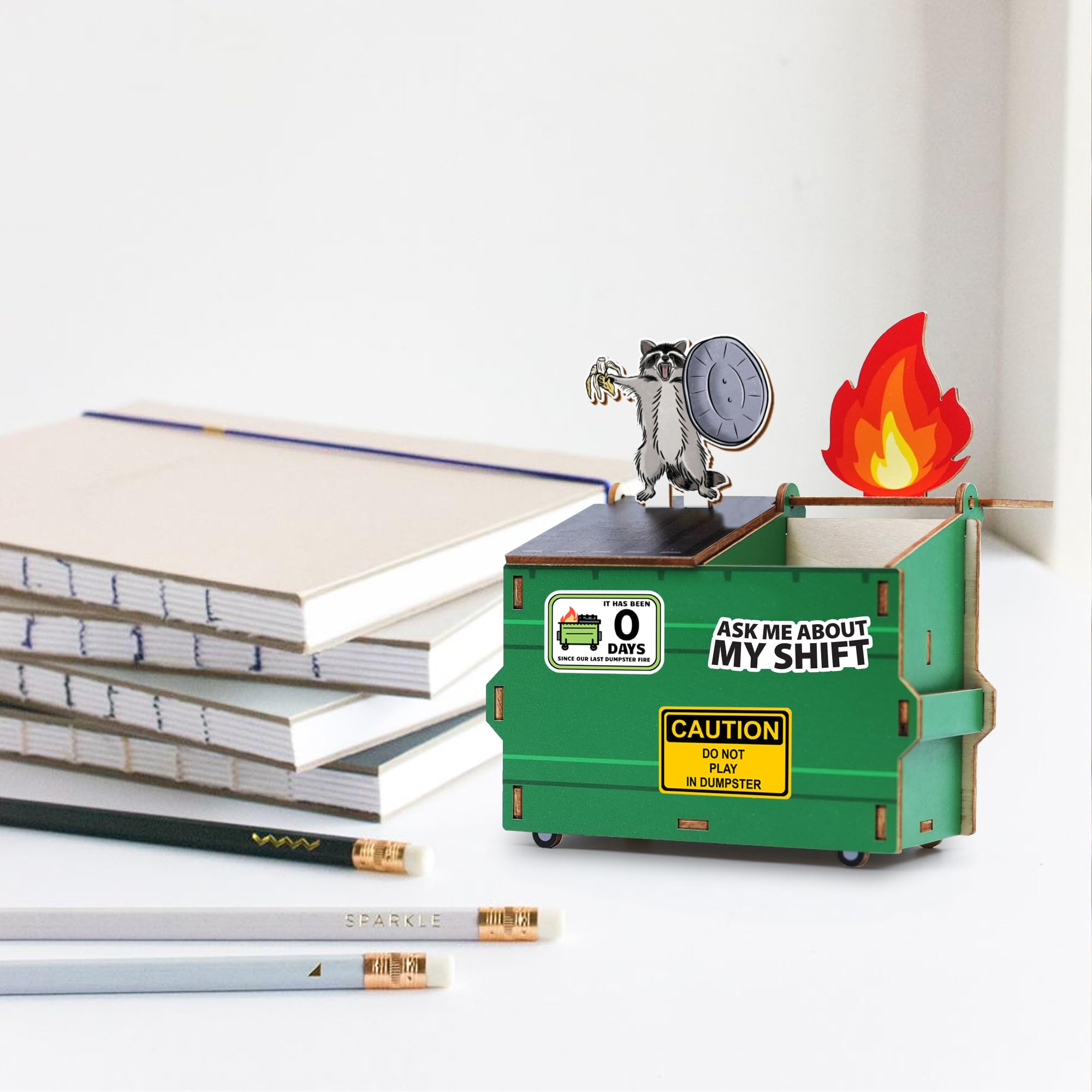 Included stickers for personalization on dumpster fire holder