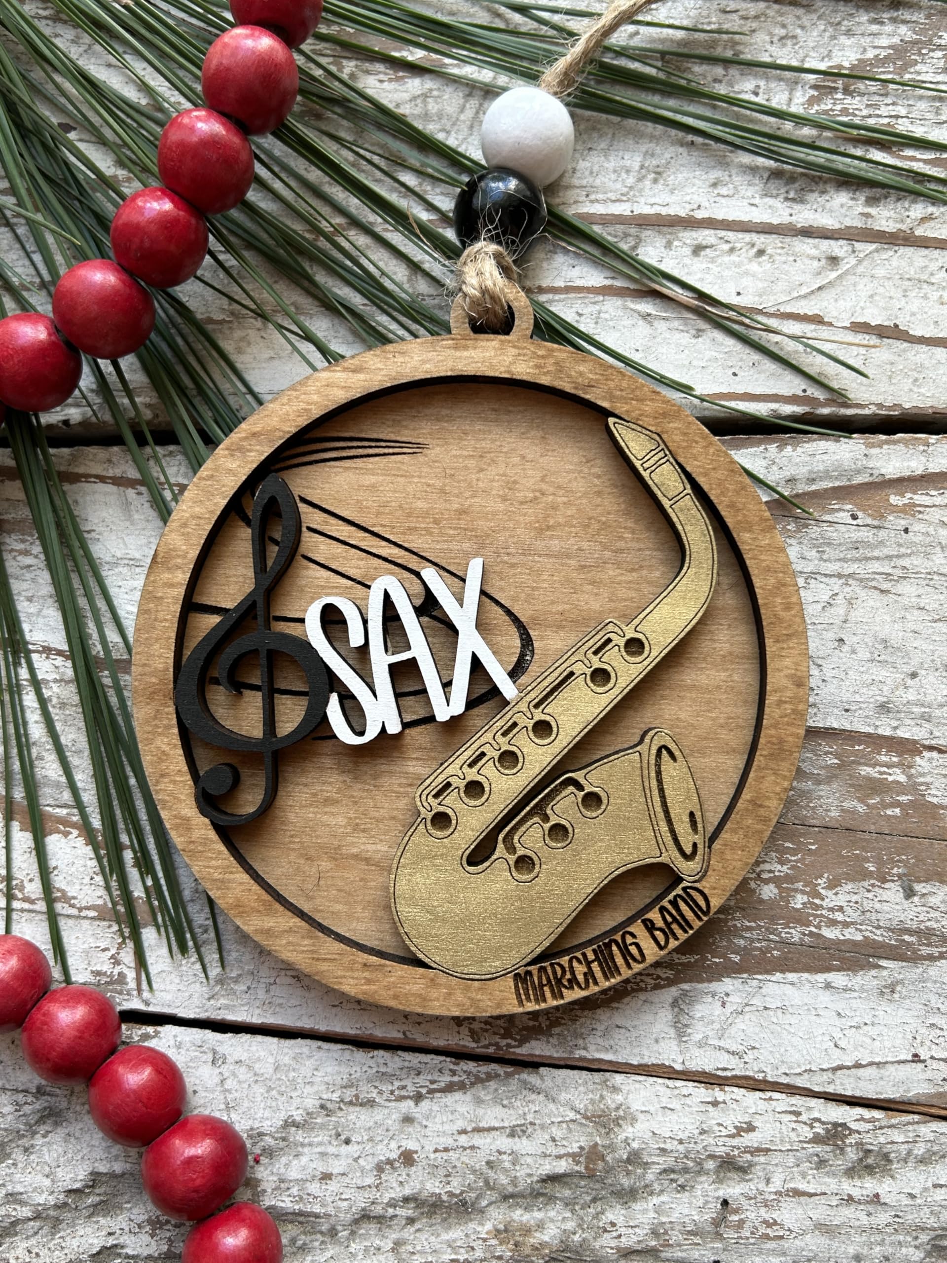 Includes two wood beads and twine for hanging on a tree