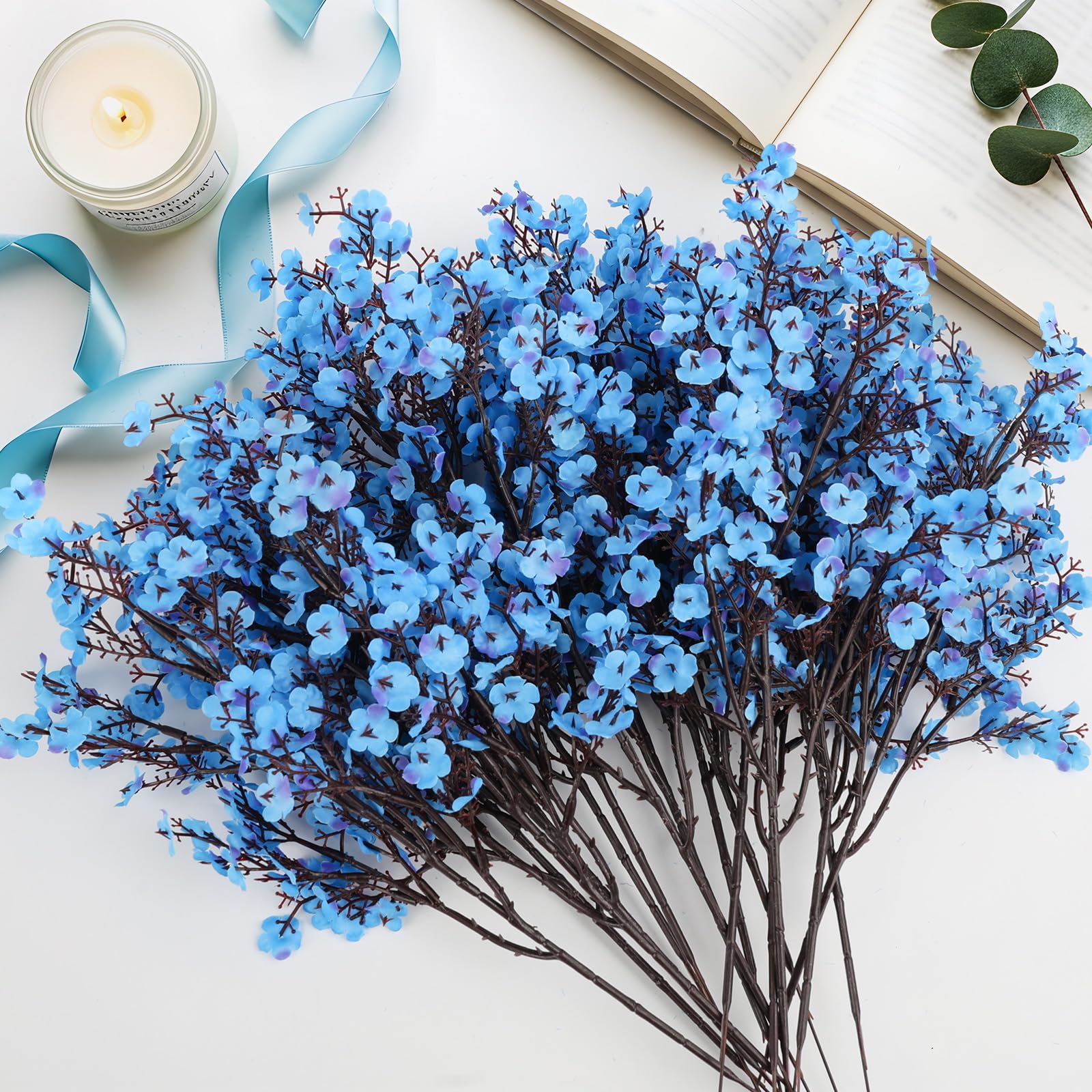 Indoor and outdoor decor using faux babys breath flowers on tables
