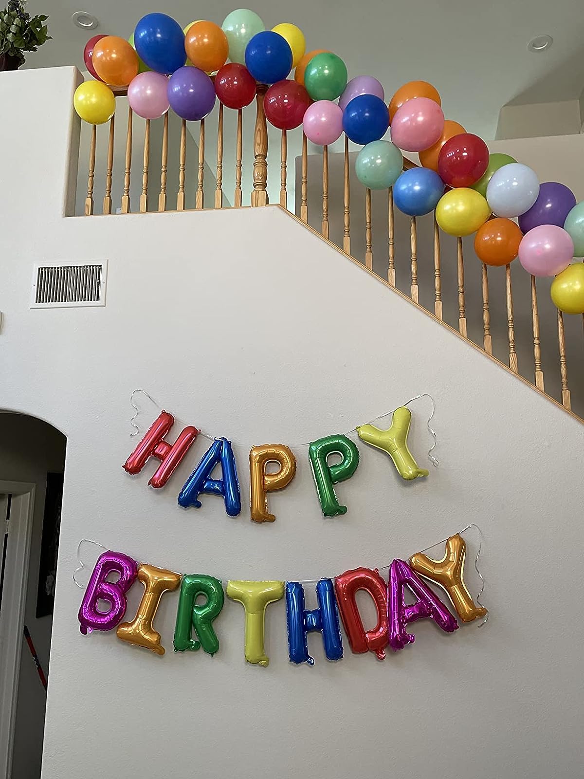Balloon banner kit includes straw and ribbon for inflation