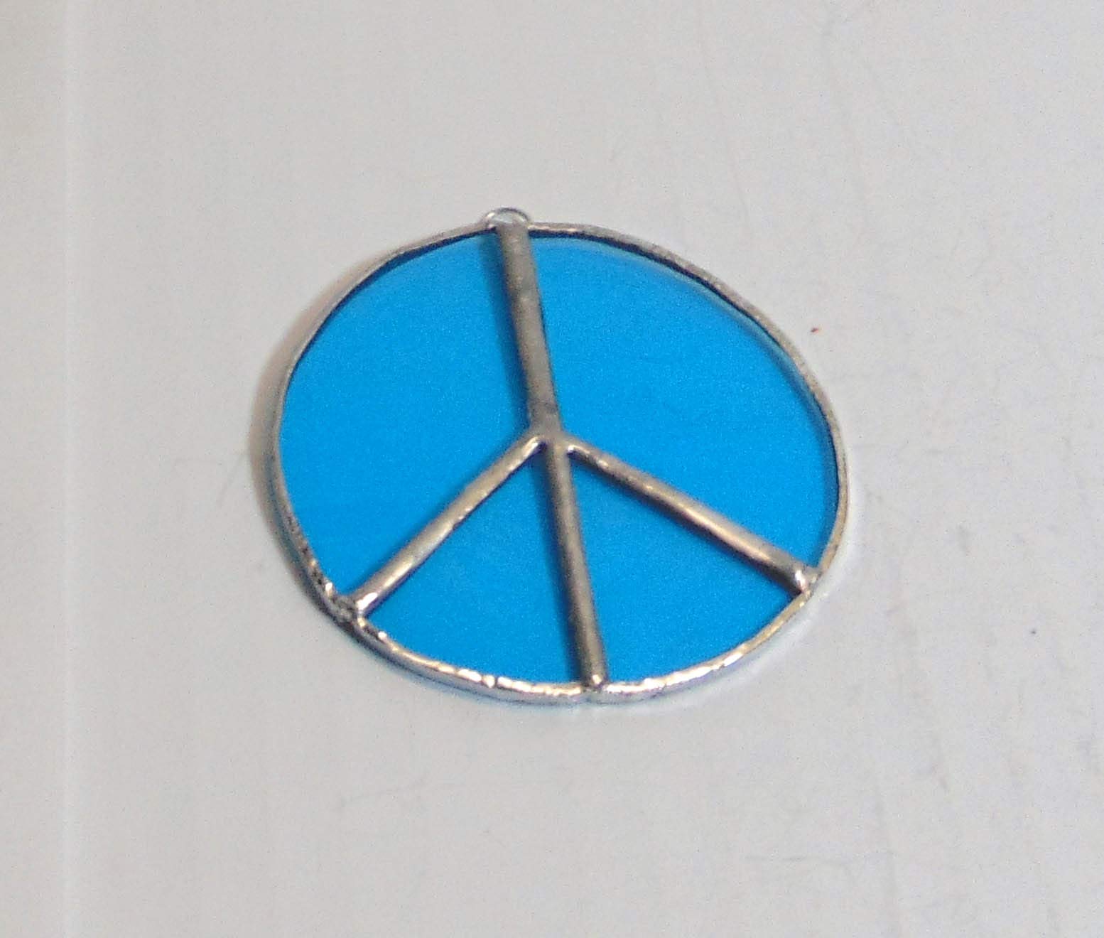 Small 3 inch round blue peace sign ornament