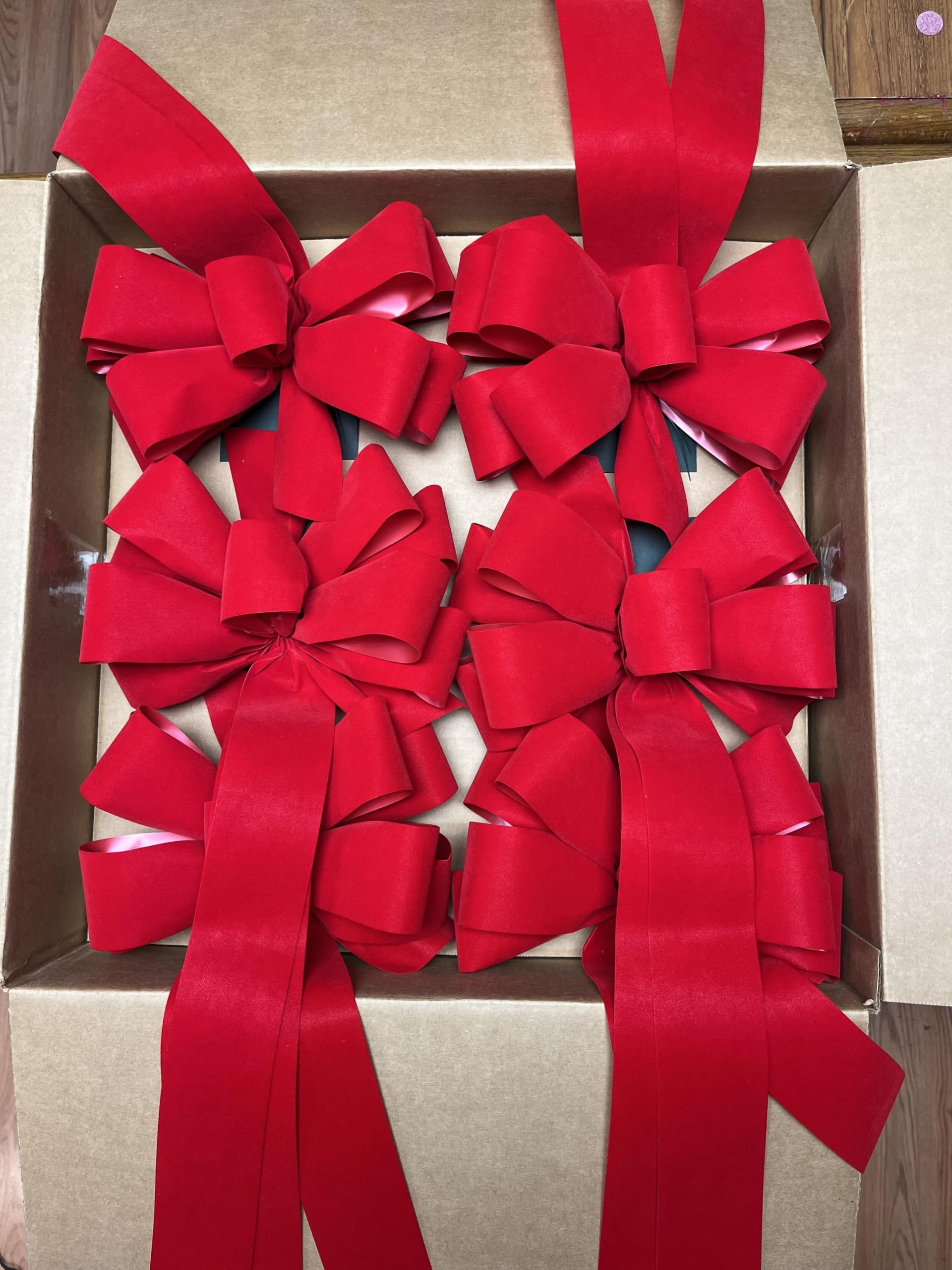 Weather resistant red velvet bows for holiday decor