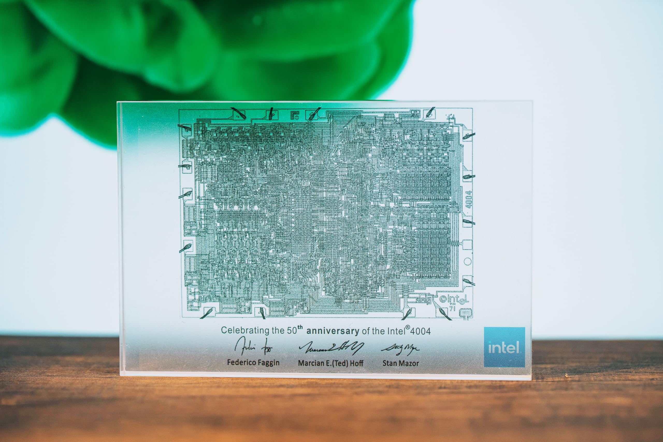 Intel 4004 CPU wall art shown on a desk setup