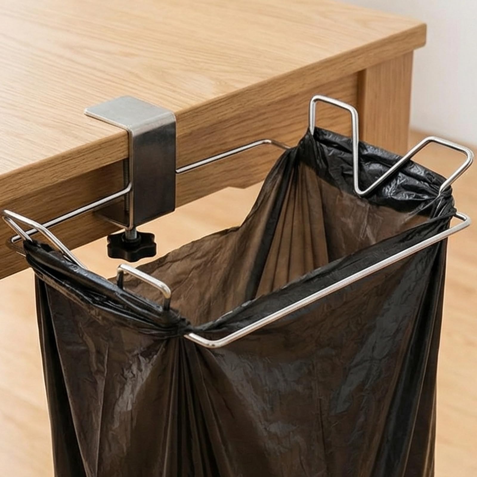 INTERSNUG stainless steel trash bag holder on a kitchen table